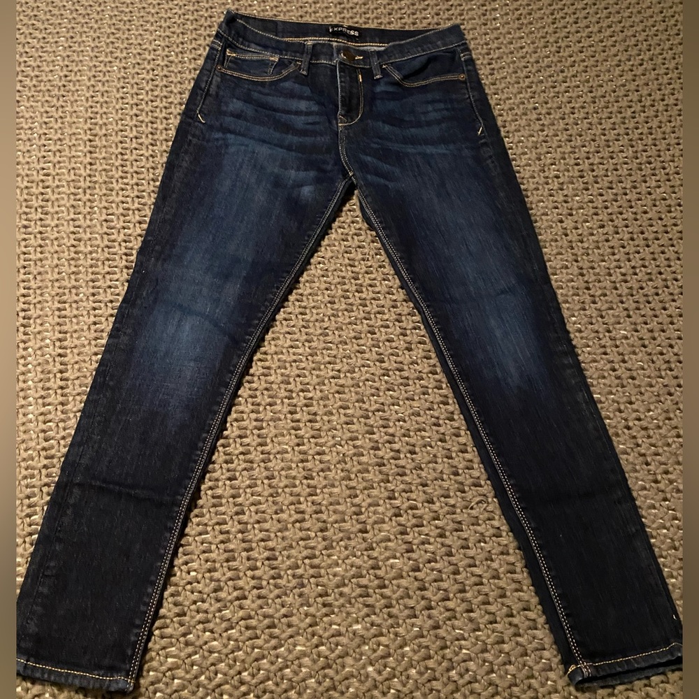Express dark mid rise jeans size 6